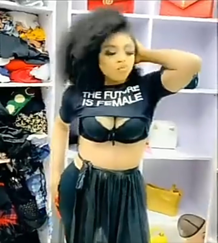 Bobrisky shows off his "boobs" while rocking a crop top with the words "The Future Is Female" (video)