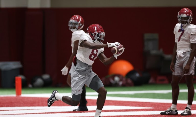 Tyler Harrell (#8) makes a catch for Alabama in practice