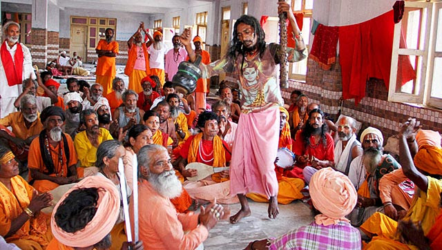 Devotees sing religious songs