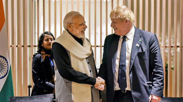  Prime Minister Narendra Modi shakes hands with Boris Johnson. File 