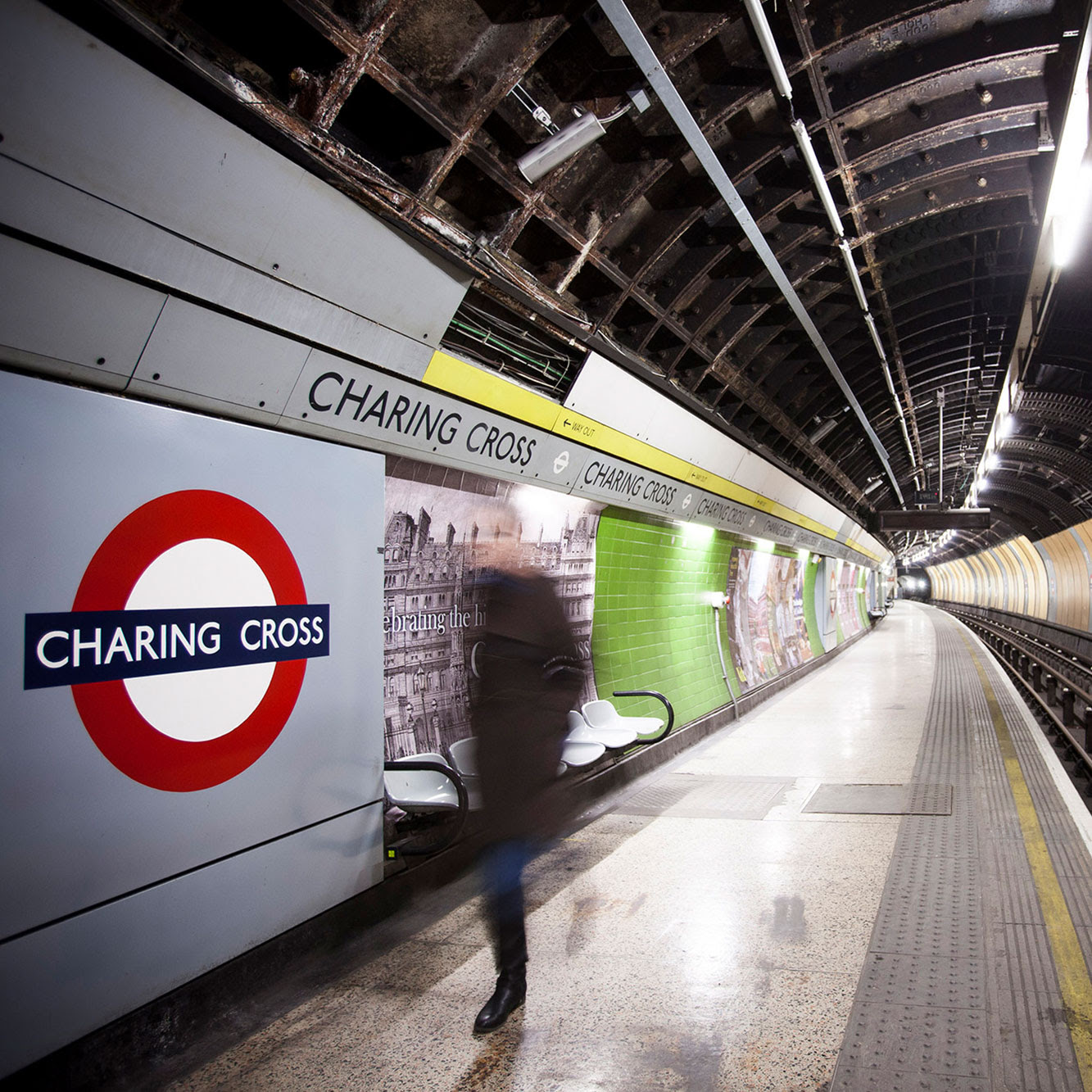 A person walking down the disused Jubilee platform at Charing Cross station