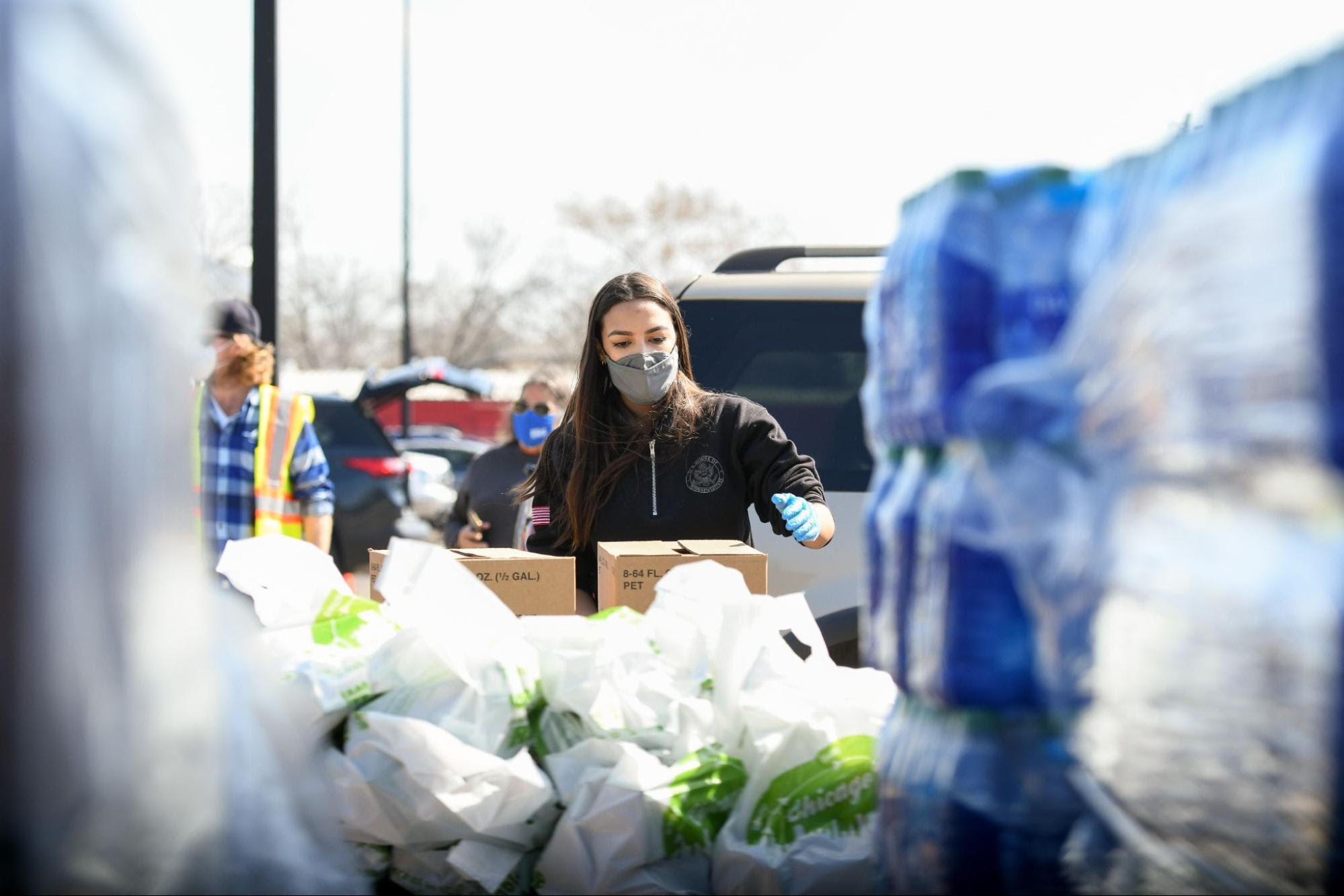 Alexandria filling bags with food and water in Texas