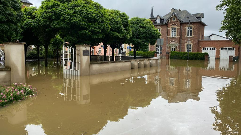 A 15 July 2021 photo shows the street outside the CNL in Mersch submerged in muddy flood water Photo: CNL