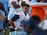 Tennessee Titans quarterback Marcus Mariota looks on from the sideline during the second half of an NFL football game against the Denver Broncos, Sunday, Oct. 13, 2019, in Denver. (AP Photo/David Zalubowski)