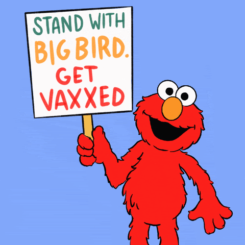 Image of Elmo holding a sign that says "stand with big bird. get vaxxed"