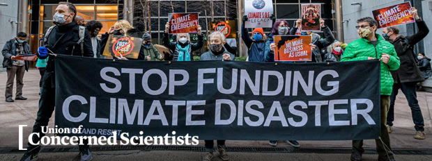 Climate activists protesting at the headquarters of investment management firm BlackRock in New York City to demand the company divest from fossil fuel holdings.
