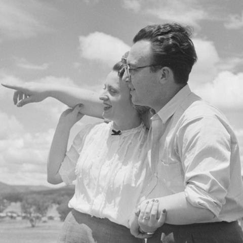 Black and white image of a couple in side embrace