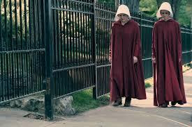 handmaids walking side by side