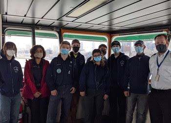 Photo of people in the wheelhouse of the ferry Puyallup