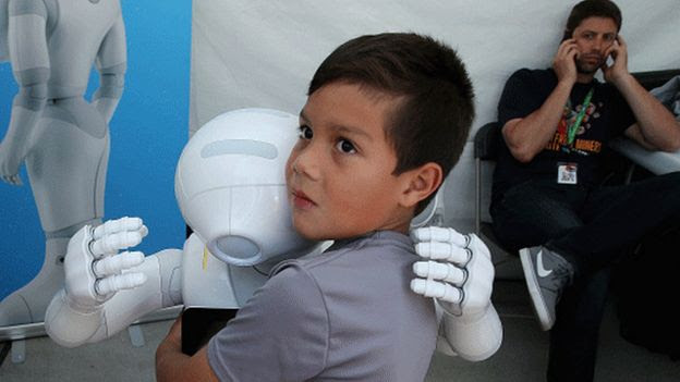 Pepper robot with a boy