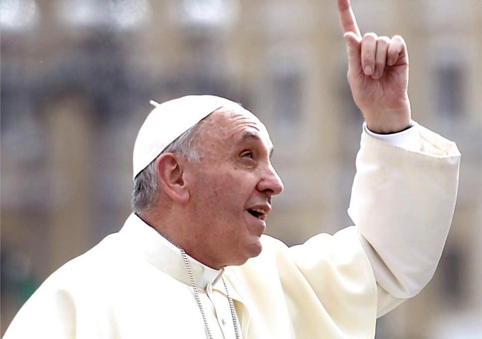 Pope Francis gestures upon his arrival in St Peter's square