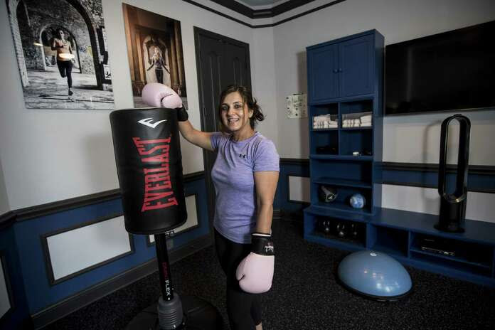 Neda Malkani poses for a portrait in her excercise room, that was once a formal dining room at her home, on Friday, June 1, 2018, in Humble. ( Brett Coomer / Houston Chronicle ) Photo: Brett Coomer, Staff / Houston Chronicle / © 2018 Houston Chronicle