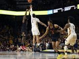 Maryland&#39;s Darryl Morsell (11) shoots the go-ahead 3-pointer over Minnesota&#39;s Tre&#39; Williams (1) as Minnesota&#39;s Marcus Carr (5) defends against Maryland&#39;s Aaron Wiggins (2) during the second half of an NCAA college basketball game Wednesday, Feb. 26, 2020, in Minneapolis. Maryland won 74-73. (AP Photo/Hannah Foslien)