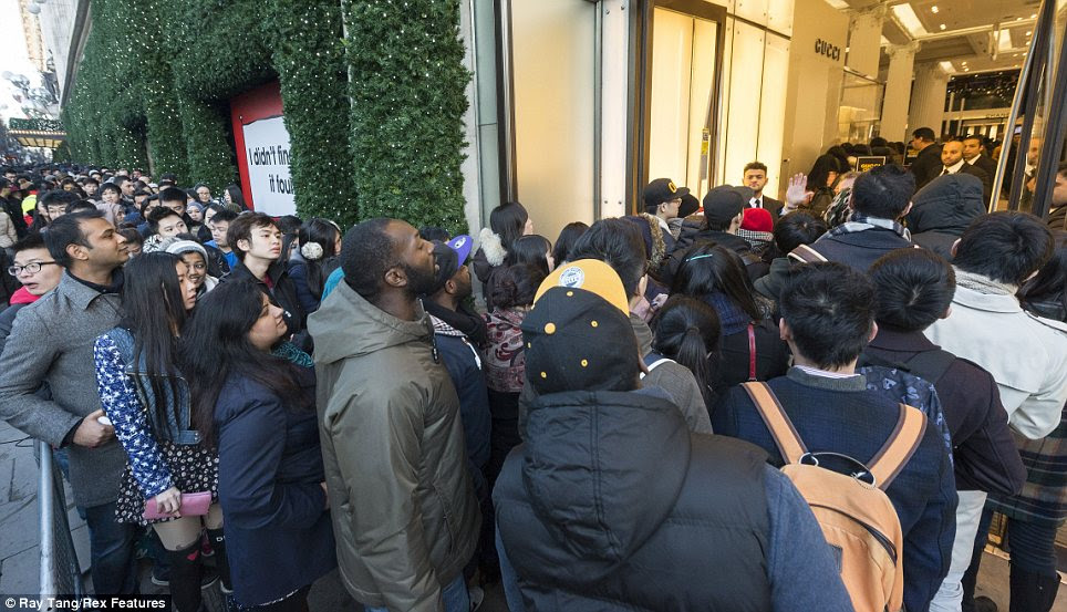 Sales: A long queue formed outside Selfridges on London's Oxford Street today as shoppers hunted for Boxing Day bargains