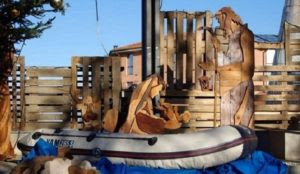 Italian mayor puts migrant dinghy in Nativity Scene