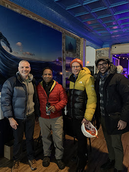 A group of ice fest attendees poses for a picture, including Brad Garmon.