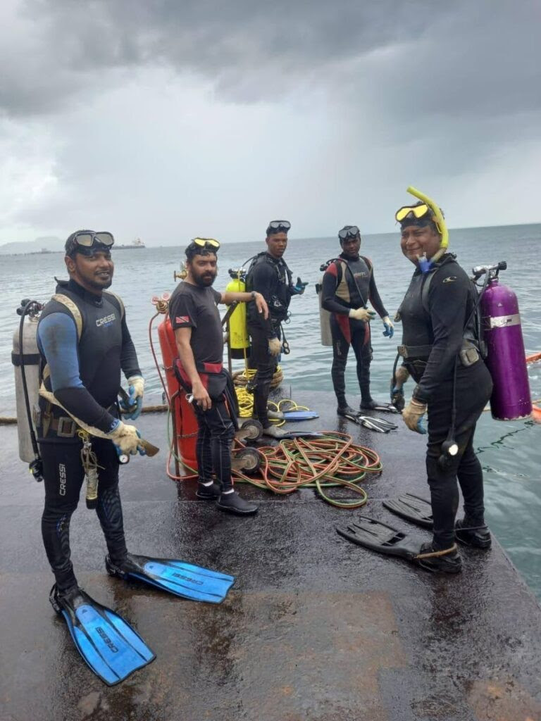 The five divers employed by a private company hired by Paria Trading Co Ltd to do maintenance work on a 36-inch pipeline in one of the last photos taken at Pointe-a-Pierre on Friday. From left are, Christopher Boodram, who survived, Kazim Ali Jr, Yusuf Henry, Rishi Nagassar and Fyzal Kurban. -