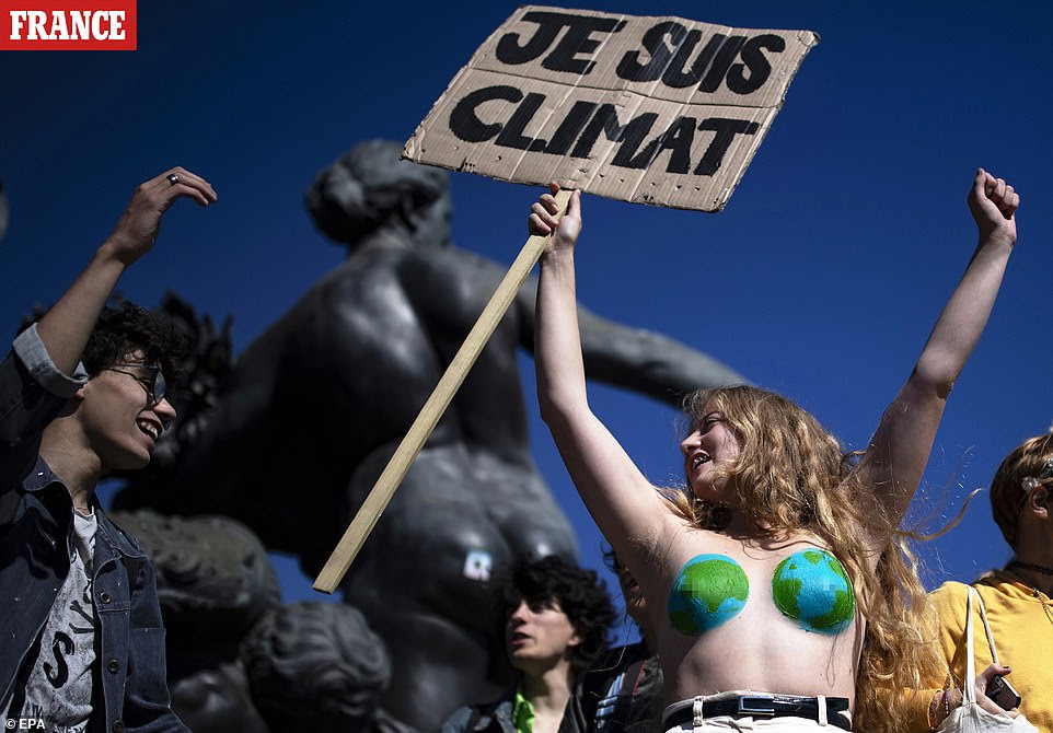 Protesters gather during a global climate strike demonstration in Paris, France