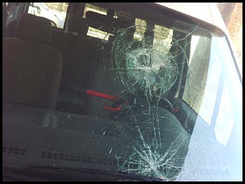 Illustrative photo: Arab stone throwing hits a windshield.