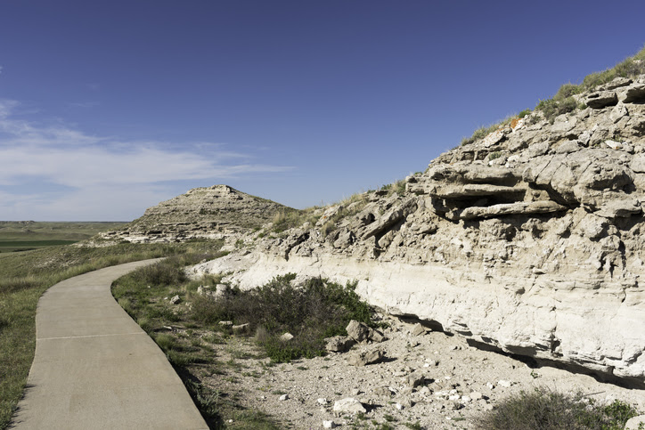 a rocky landscape against a blue sky