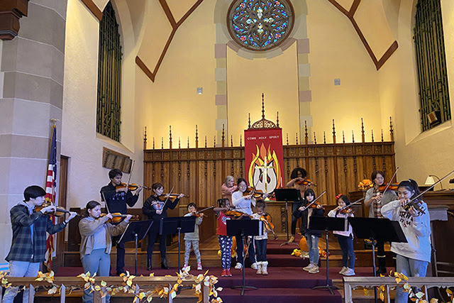 Students from the Community Music Project rehearse for a 2022 Christmas concert to help Guatemalans in need of cataract surgery. File photo courtesy of Haven United Methodist Church.