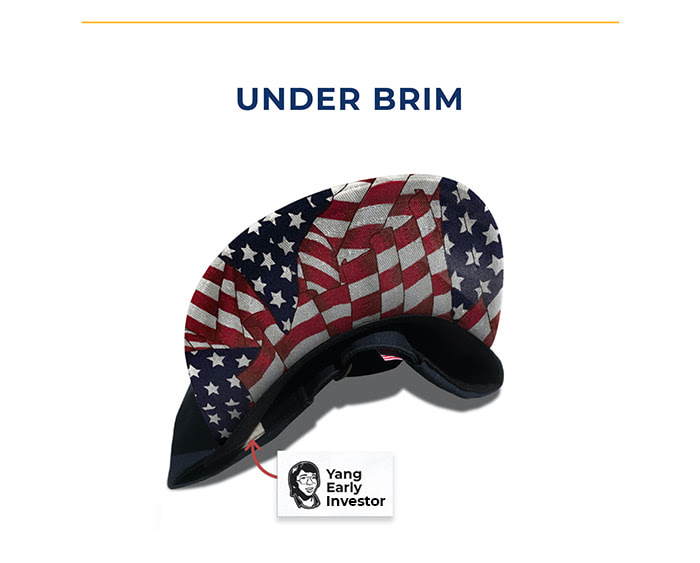 Under brim design with American flag collage. Tag with drawing of young Andrew Yang and “Yang Early Investor”