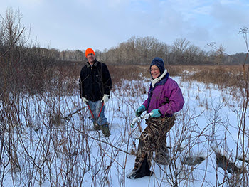 volunteers in snowy field