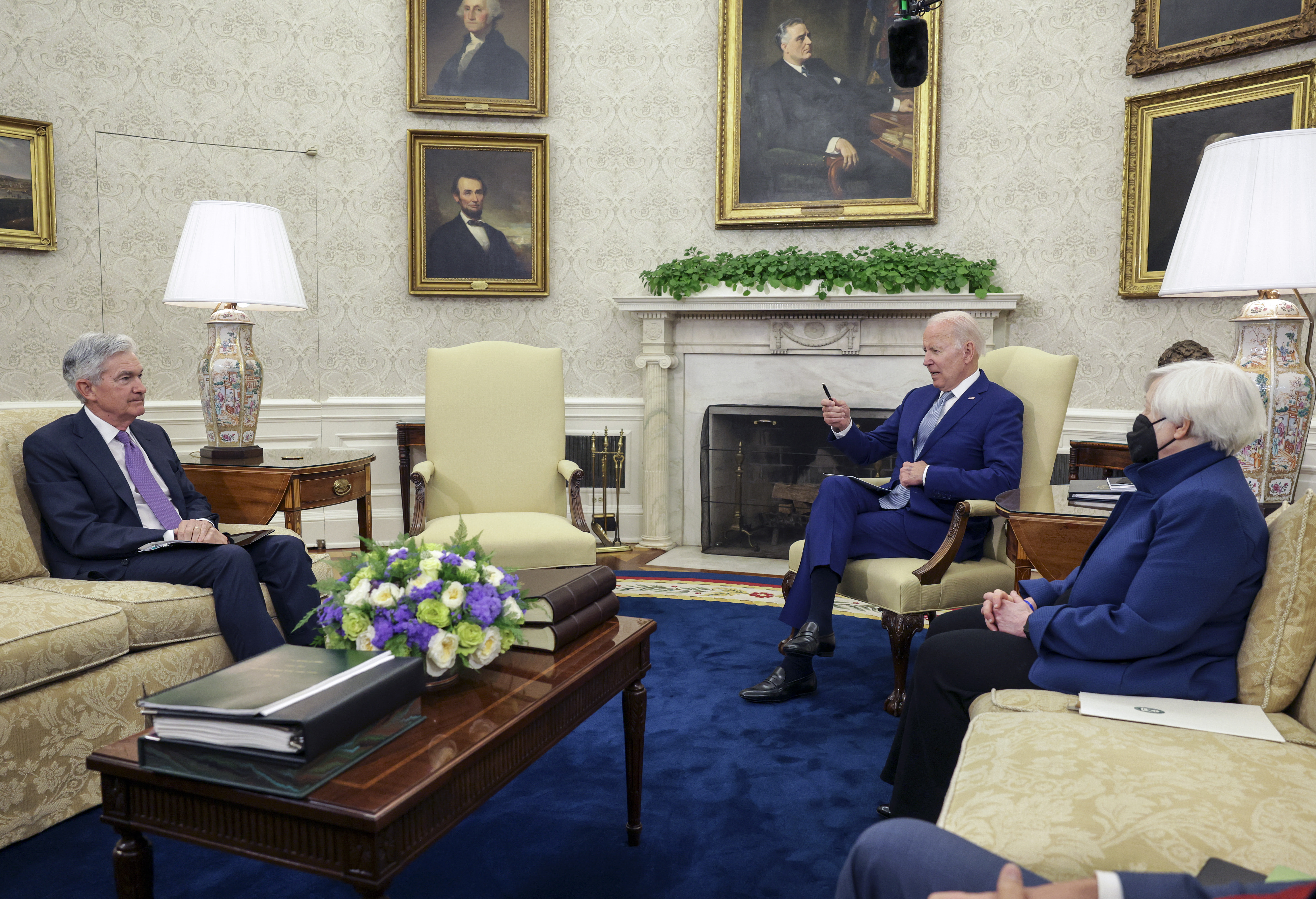 President Joe Biden sits with Federal Reserve Chair Jerome Powell and Treasury Secretary Janet Yellen in the Oval Office. 