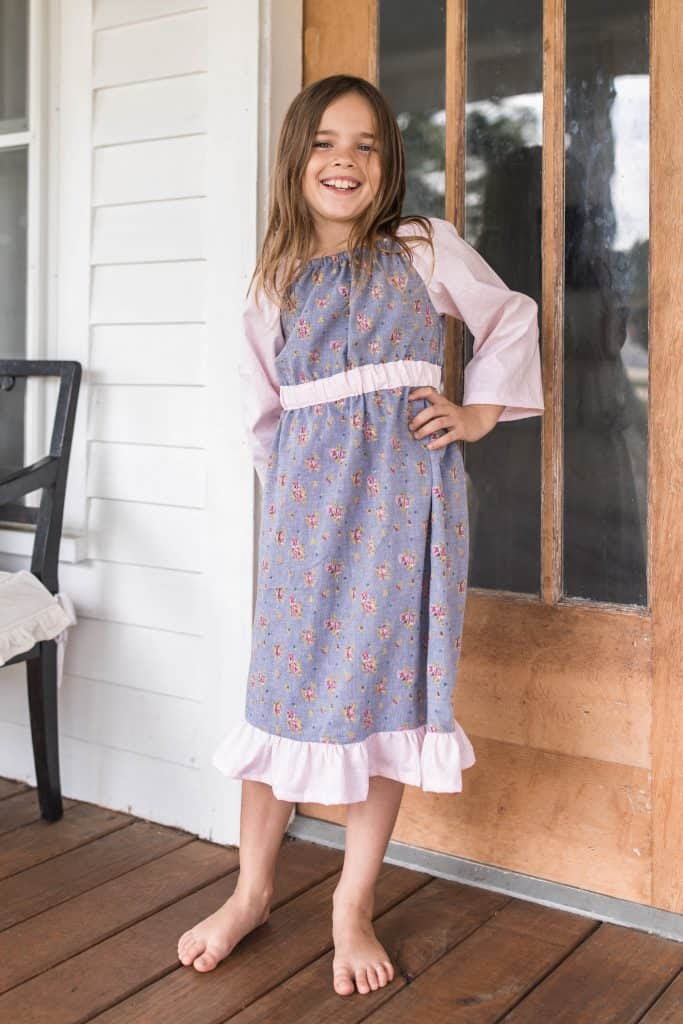 girl in a floral long sleeve peasant dress - dress patterns for girls