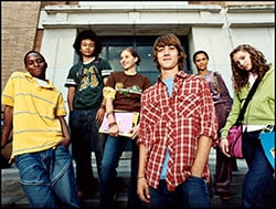 The figure above is a photograph showing a group of adolescents.
