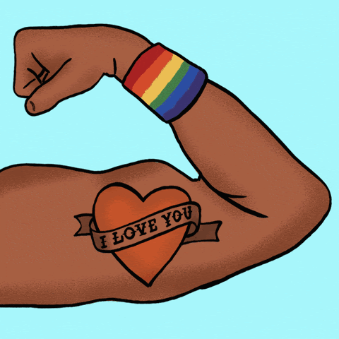 A flexed bicep with a heart tattoo that reads "I love you". On the wrist: a rainbow-colored wristband.
