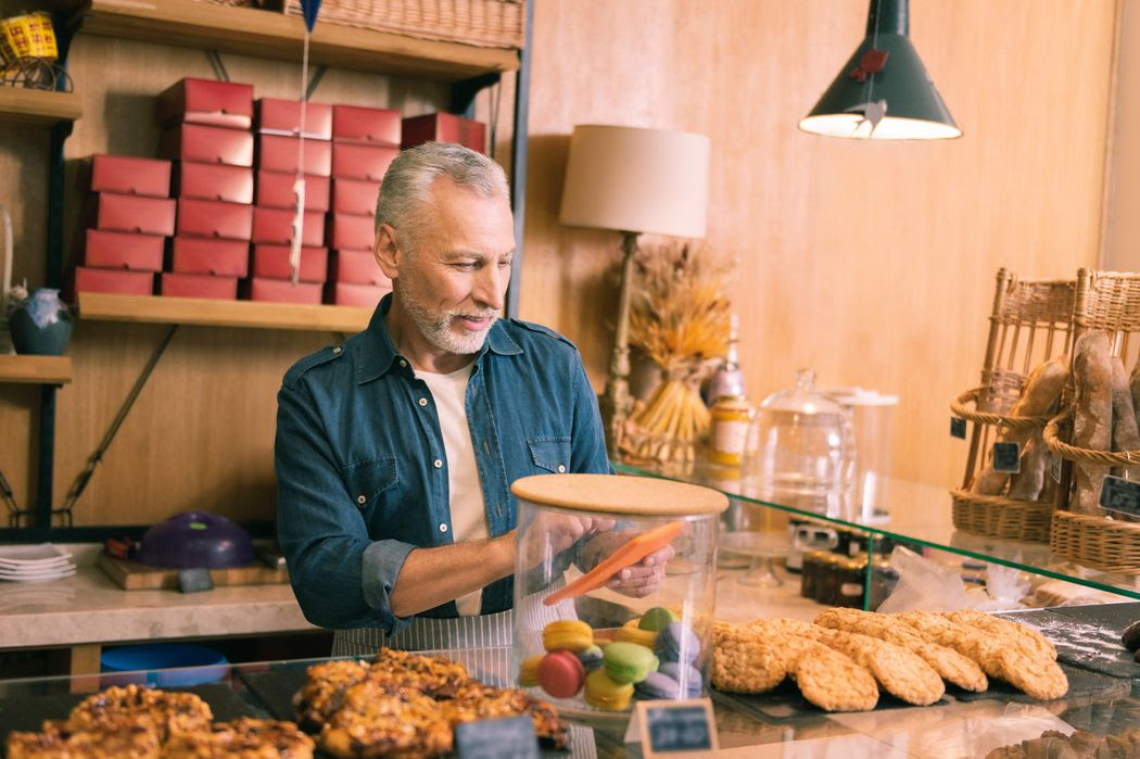 Elderly male working in a bakery