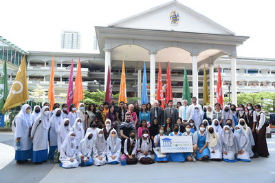 Tengku Zatashah, Tan Sri Dr Jemilah Mahmood and Professor Sibrandes Poppema with Students from SMK Assunta and International Students from Sunway University