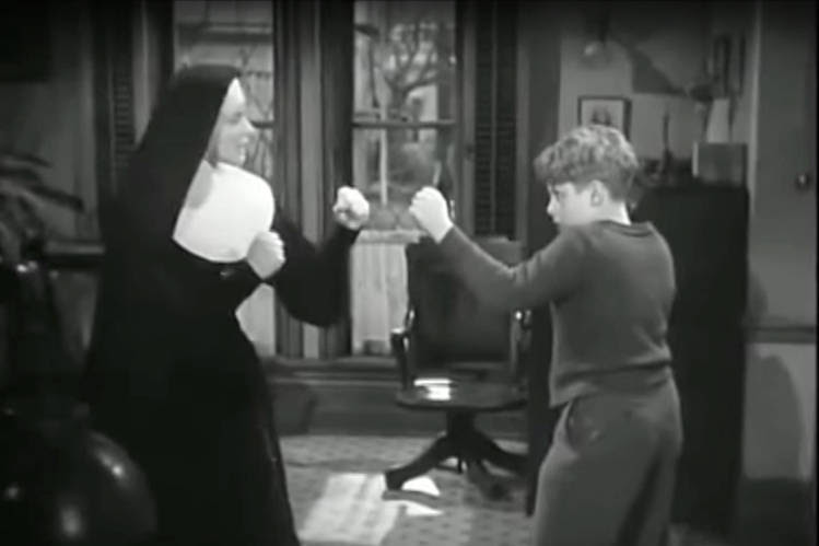Sister Mary Benedict (Ingrid Bergman) gives a boxing lesson in ‘The Bells of St. Mary’s’ (1945).
