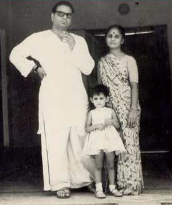 An old picture of Mannu Bhandari with her husband and daughter