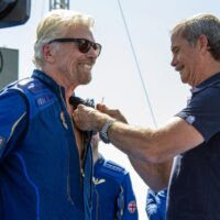 Billionaire Richard Branson first to space on commercial flight