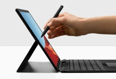 college student using a Microsoft Surface