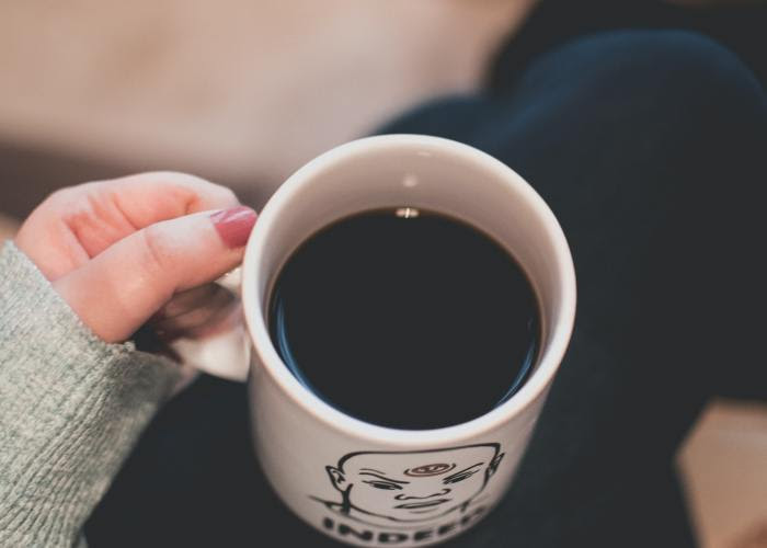 drinking coffee in my favorite spot during my morning routine