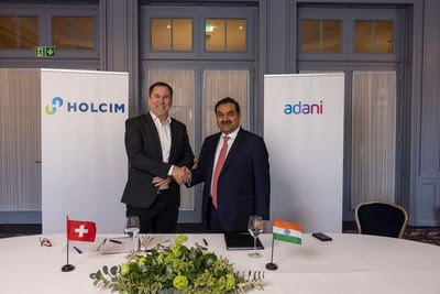 Mr Gautam Adani Chairman Adani Group with Mr Jan Jenisch CEO Holcim Limited Mr Gautam Adani Chairman Adani Group with Mr Jan Jenisch CEO Holcim Limited