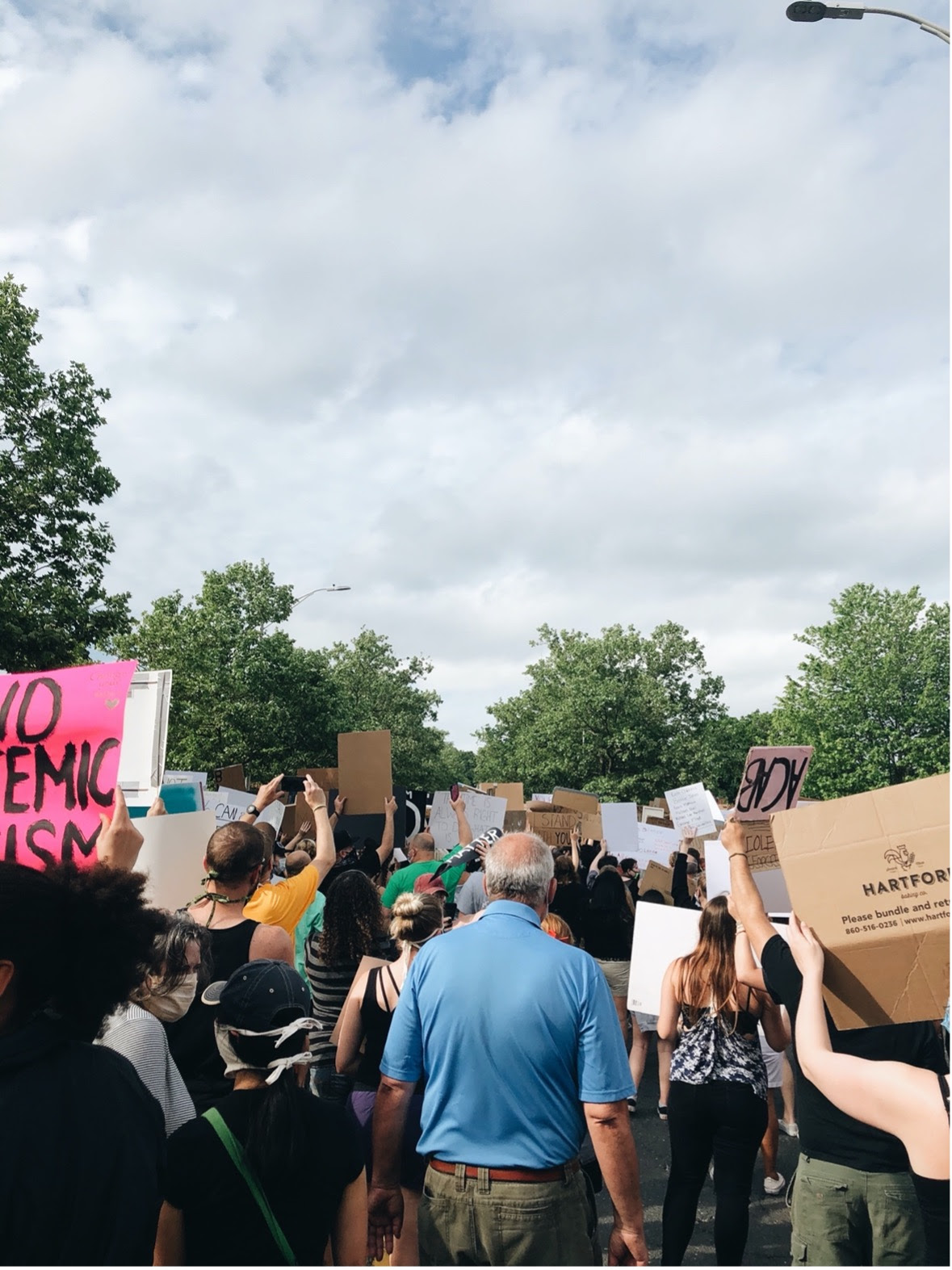 A small community of people gather in Willimantic, CT to stand in solidarity and peacefully protest the killing of George Floyd by Minneapolis Police (2020)