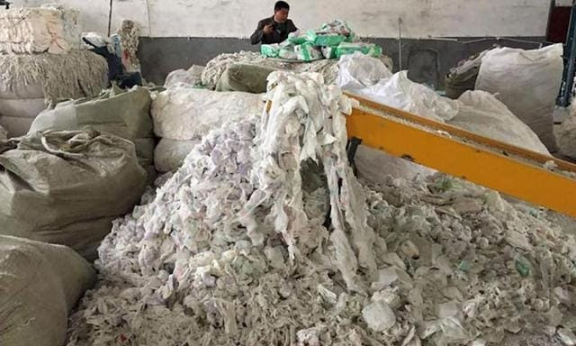 Chinese factory caught recycling used nappies to make new ones