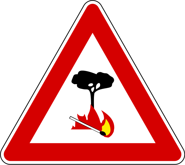 A picture containing traffic sign, signDescription automatically generated