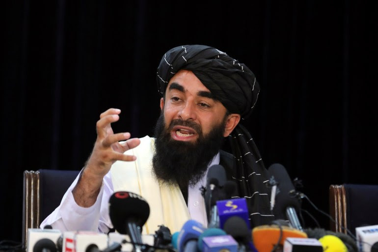 'We have expelled the foreigners and I would like to congratulate the whole nation on this,' Taliban spokesman Zabihullah Mujahid said in Kabul, Afghanistan [Rahmat Gul/AP Photo]