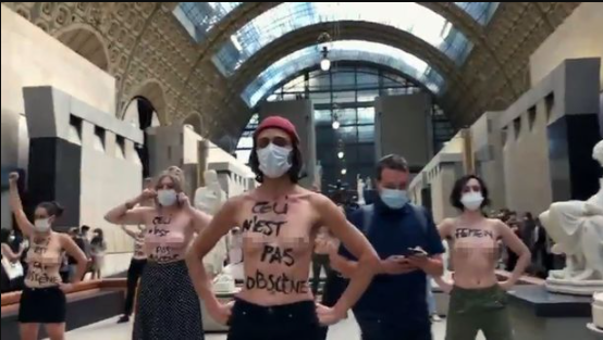 Feminists pose topless to protest after a woman was denied entry to museum over 