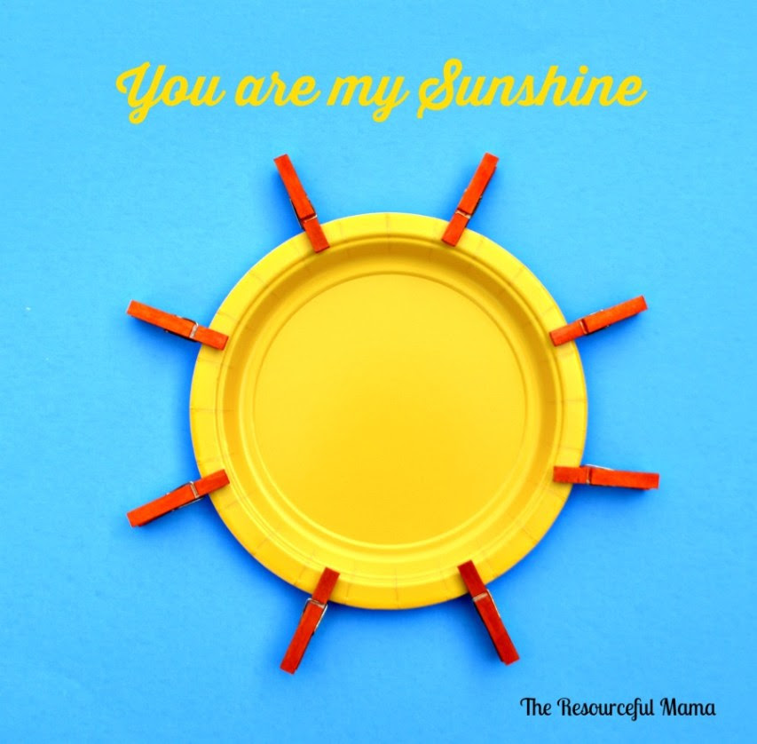 You are my sunshine paper plate and mini clothespin sun kid craft project.