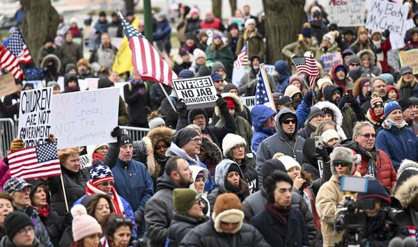 Demonstrators gather at New York Freedom rally, protesting vaccine and mask mandates before New York Gov. Kathy Hochul delivers her State of the State address at the state Capitol, Wednesday, Jan. 5, 2022, in Albany, N.Y. (AP Photo/Hans Pennink)