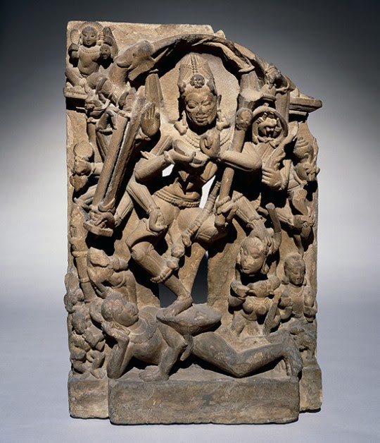 A light brown statue of the Tantric Chamunda 