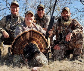 Female hunter with turkey harvest