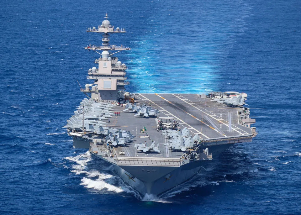 Aircraft attached to Carrier Air Wing (CVW) 8 sit on USS Gerald R. Ford&#39;s (CVN 78) flight deck as the ship steams through the Atlantic Ocean, April 13, 2022