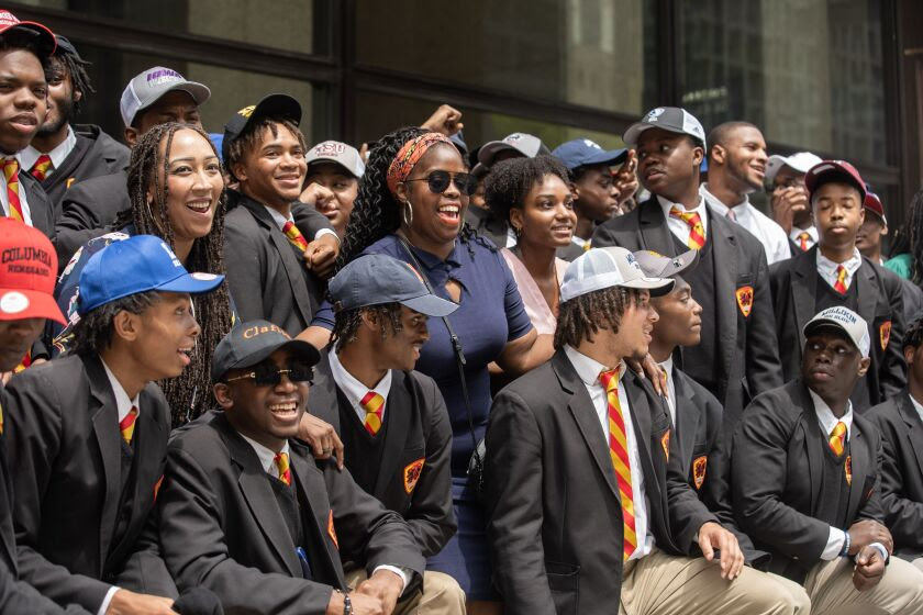 Urban Prep Academies graduating seniors and faculty pose for a video after the school’s College Signing Day celebration at Daley Plaza on Thursday, May 19, 2022.